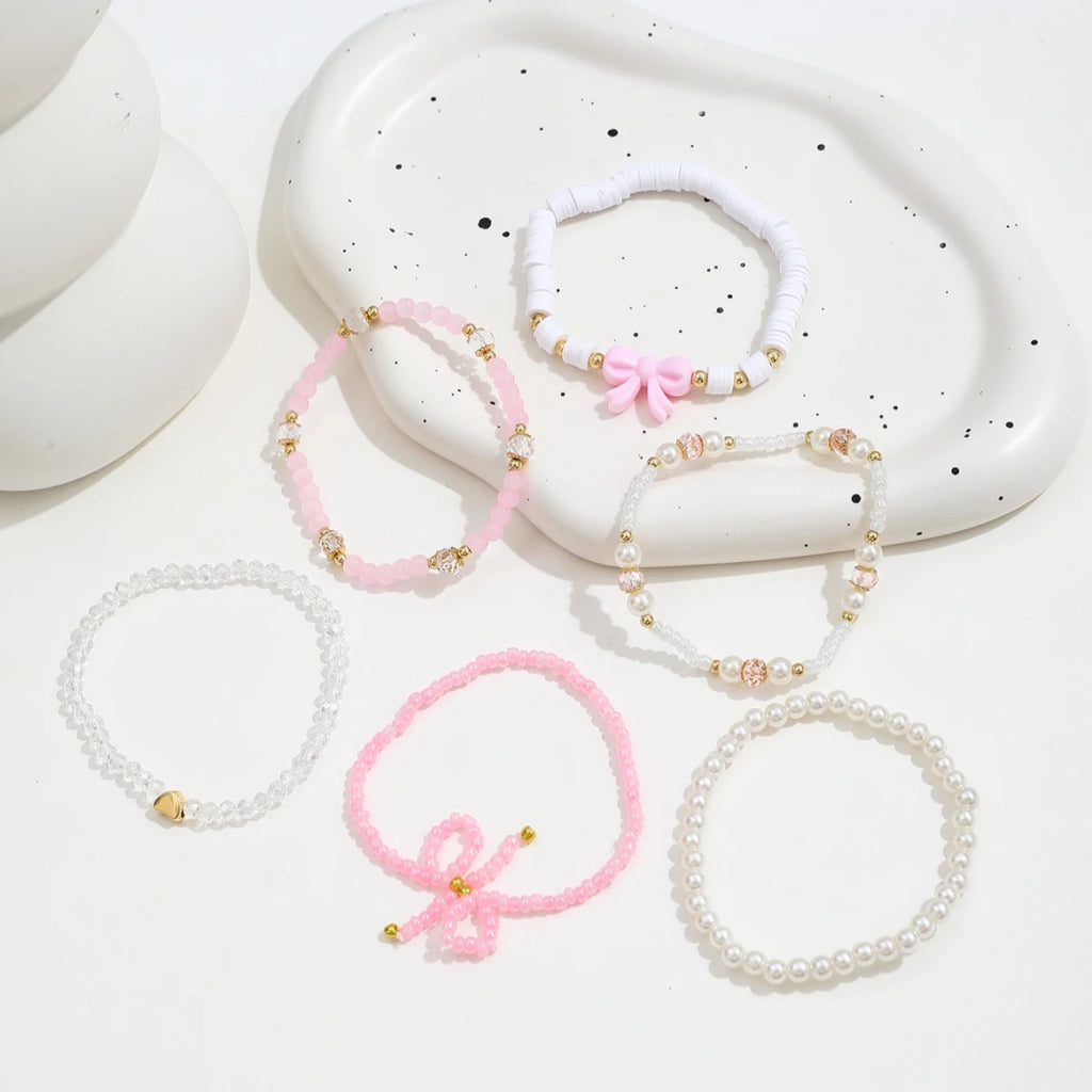 🎀 6-Piece Pearl & Bow Bracelet Set