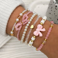 🎀 6-Piece Pearl & Bow Bracelet Set