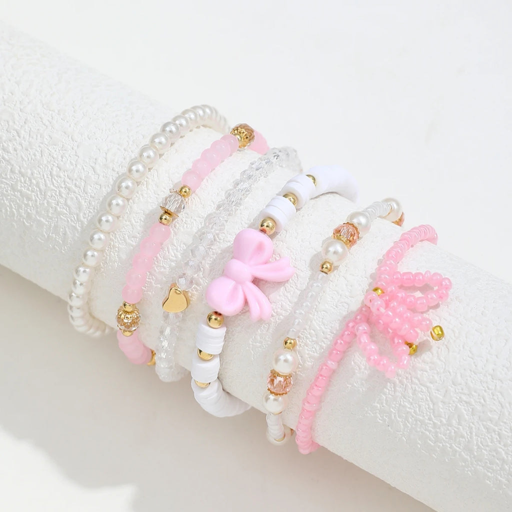 🎀 6-Piece Pearl & Bow Bracelet Set