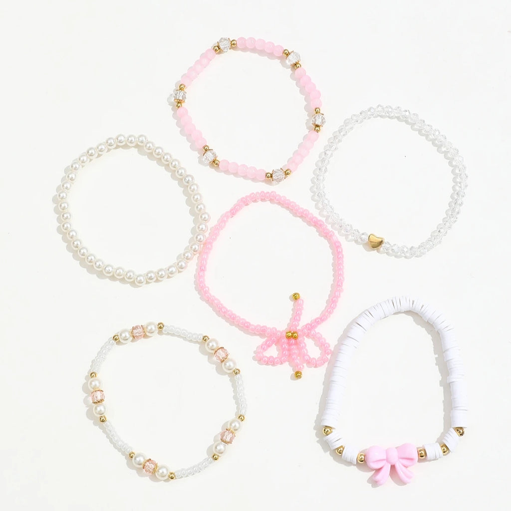 🎀 6-Piece Pearl & Bow Bracelet Set