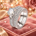 Silver ring set on a sparkling rose velvet background